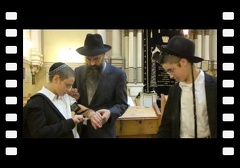 Yossi first Tefilin with his father and brother